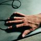 Hand attached to polygraph machine.